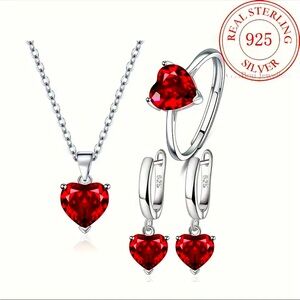 Sterling Silver Heart Set with Vibrant Red Stones